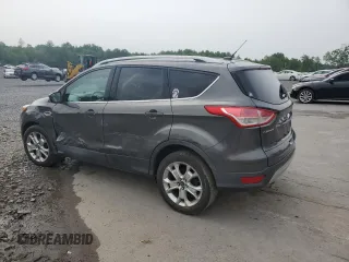 2016 Ford Escape Titanium with VIN 1FMCU9J90GUA01974, listed as a Copart auction lot 60376265 with 177,384 mi miles and Salvage title. Bid and sale history available at DreamBid. Image 2.