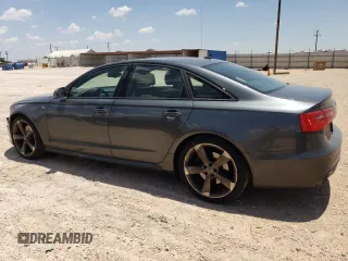 2015 Audi A6 3.0L TDI Prestige with VIN WAUHMAFC3FN003689, listed as a Copart auction lot 67126604 with 126,183 mi miles and Salvage Title. Bid and sale history available at carsss.com. Image 2.