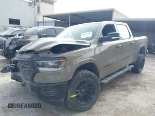 2020 Ram 1500 Big Horn with VIN 1C6SRFFT0LN301093, listed as a IAAI auction lot 41607746 with 65,223 mi miles and . Bid and sale history available at DreamBid. Image 2.