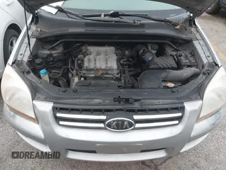 2005 Kia Sportage LX with VIN KNDJE723257071317, listed as a IAAI auction lot 41547643 with 267,610 mi miles and . Bid and sale history available at carsss.com. Image 10.