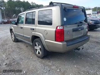 2006 Jeep Commander with VIN 1J8HG48K16C104055, listed as a IAAI auction lot 41487376 with 176,234 mi miles. Bid and sale history available at carsss.com. Image 3.