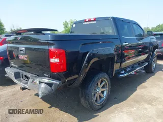 2014 GMC Sierra 1500 SLT with VIN 3GTU2VEC1EG363079, listed as a IAAI auction lot 42419679 with 128,055 mi miles and . Bid and sale history available at DreamBid. Image 4.