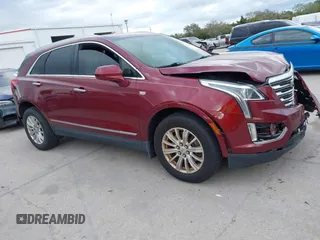 2017 Cadillac XT5 FWD with VIN 1GYKNARS2HZ107587, listed as a IAAI auction lot 41614842 with 124,611 mi miles and . Bid and sale history available at carsss.com. Image 13.