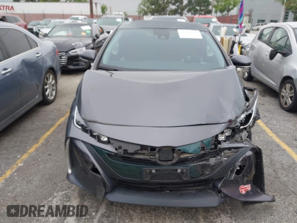 2018 Toyota Prius Plus with VIN JTDKARFP5J3095377, listed as a IAAI auction lot 42153552 with 77,255 mi miles and . Bid and sale history available at DreamBid. Image 13.