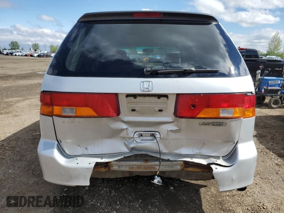 2002 Honda Odyssey EX with VIN 2HKRL186X2H006763, listed as a Copart auction lot 57317075 with 282,090 mi miles and Salvage title. Bid and sale history available at DreamBid. Image 6.