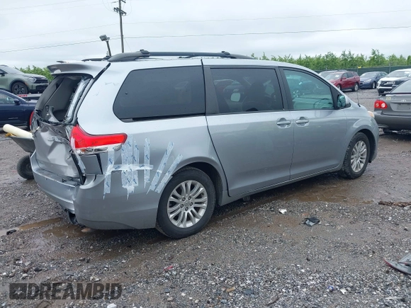 2012 Toyota Sienna XLE AAS with VIN 5TDYK3DC2CS205856, listed as a IAAI auction lot 42230009 with 136,588 mi miles and . Bid and sale history available at DreamBid. Image 4.