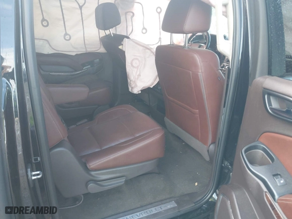 2018 Chevrolet Suburban Premier with VIN 1GNSCJKC2JR199702, listed as a IAAI auction lot 41136128 with 80,103 mi miles. Bid and sale history available at carsss.com. Image 8.