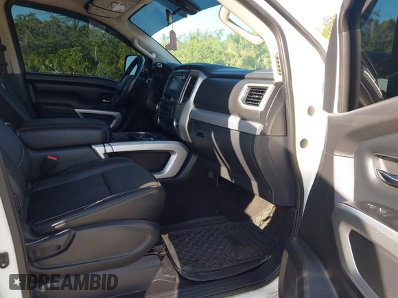 2016 Nissan Titan Platinum Reserve with VIN 1N6BA1F4XGN517905, listed as a IAAI auction lot 42676671 with 110,004 mi miles and . Bid and sale history available at DreamBid. Image 5.
