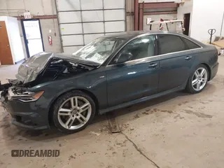 2016 Audi A6 2.0T Premium Plus with VIN WAUGFAFC8GN088505, listed as a IAAI auction lot 41569043 with 98,528 mi miles. Bid and sale history available at carsss.com. Image 2.