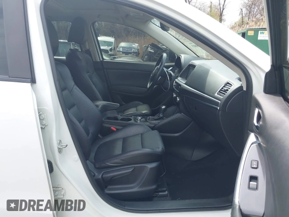 2016 Mazda CX-5 Grand Touring with VIN JM3KE4DY6G0618121, listed as a IAAI auction lot 41958805 with 101,232 mi miles. Bid and sale history available at carsss.com. Image 5.