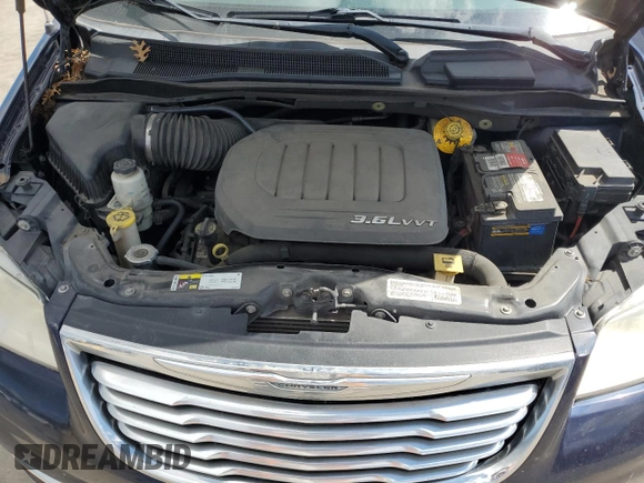 2014 Chrysler Town & Country Touring with VIN 2C4RC1BG8ER383701, listed as a Copart auction lot 70959814 with 157,180 mi miles and Salvage Title. Bid and sale history available at DreamBid. Image 12.