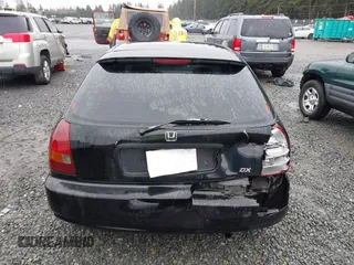 2000 Honda Civic DX with VIN 2HGEJ6344YH110322, listed as a IAAI auction lot 41871438 with 168,603 mi miles. Bid and sale history available at carsss.com. Image 16.