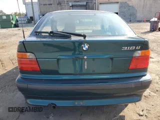 1997 BMW 3 Series 318tiA with VIN WBACG8321VAU39596, listed as a Copart auction lot 72657404 with 0 mi miles and Salvage Title. Bid and sale history available at carsss.com. Image 6.