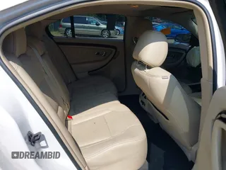 2014 Ford Taurus Limited with VIN 1FAHP2F8XEG181491, listed as a IAAI auction lot 40277144 with 107,374 mi miles. Bid and sale history available at carsss.com. Image 8.