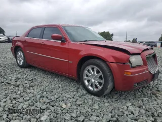 2009 Chrysler 300 Touring with VIN 2C3KA53V99H617274, listed as a Copart auction lot 71791144 with 123,045 mi miles and Salvage Title. Bid and sale history available at carsss.com. Image 4.