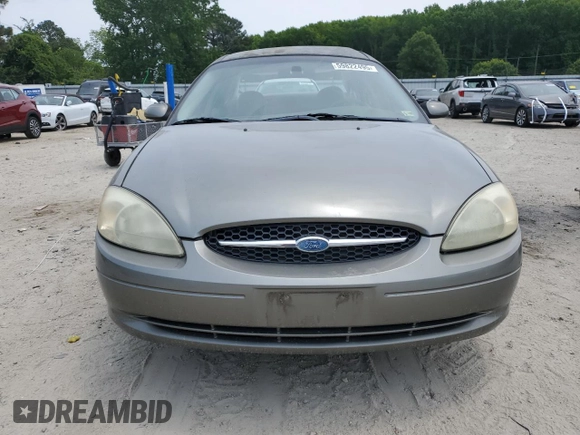 2002 Ford Taurus SES Standard with VIN 1FAFP55U42A184084, listed as a Copart auction lot 59822495 with 124,835 mi miles and Salvage title. Bid and sale history available at DreamBid. Image 5.