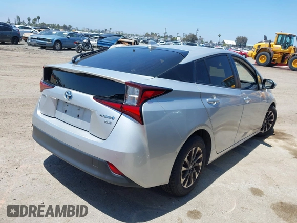 2022 Toyota Prius L Eco with VIN JTDKAMFU5N3188107, listed as a IAAI auction lot 42223649 with 180,894 mi miles and . Bid and sale history available at DreamBid. Image 4.