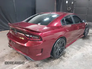 2019 Dodge Charger SRT Hellcat with VIN 2C3CDXL92KH693077, listed as a IAAI auction lot 39361432 with 57,522 mi miles and . Bid and sale history available at DreamBid. Image 4.