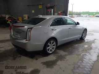 2016 Cadillac ATS Standard AWD z VIN 1G6AG5RX6G0149829, wystawiony jako IAAI lot #42165534 z przebiegiem 40 996 mil mil oraz . Historia ofert i sprzedaży dostępna na DreamBid. Obrazek 4.
