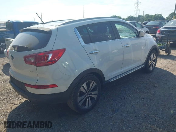 2013 Kia Sportage EX with VIN KNDPCCA22D7363985, listed as a IAAI auction lot 42621519 with 160,029 mi miles and . Bid and sale history available at DreamBid. Image 4.