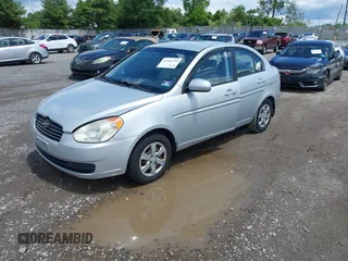 2010 Hyundai Accent GLS z VIN KMHCN4ACXAU405559, wystawiony jako IAAI lot #42351718 z przebiegiem 130 538 mil mil oraz . Historia ofert i sprzedaży dostępna na DreamBid. Obrazek 2.