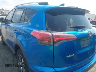 2018 Toyota RAV4 XLE with VIN JTMWFREVXJJ751586, listed as a IAAI auction lot 42586337 with 55,821 mi miles and . Bid and sale history available at DreamBid. Image 3.