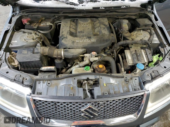 2008 Suzuki Grand Vitara w/Spare & Cargo Covers z VIN JS3TD941484100374, wystawiony jako Copart lot #44193825 z przebiegiem 187 674 mil mil oraz Szkoda całkowita • Salvage title. Historia ofert i sprzedaży dostępna na DreamBid. Obrazek 11.