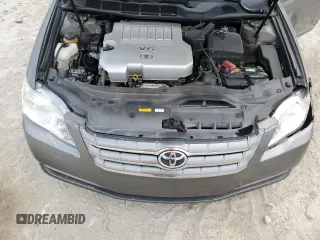 2007 Toyota Avalon XL z VIN 4T1BK36B67U191919, wystawiony jako Copart lot #56274055 z przebiegiem 188 679 mil mil oraz Szkoda całkowita • Salvage title. Historia ofert i sprzedaży dostępna na DreamBid. Obrazek 11.