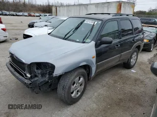2004 Mazda Tribute LX with VIN 4F2YZ04154KM02442, listed as a Copart auction lot 45147054 with 249,414 mi miles and Salvage Title. Bid and sale history available at DreamBid. Image 1.