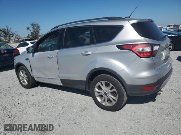 2018 Ford Escape SE with VIN 1FMCU0G98JUB49767, listed as a Copart auction lot 48140885 with 90,906 mi miles and Salvage Title. Bid and sale history available at carsss.com. Image 2.