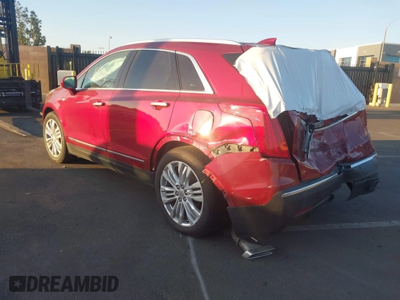 2019 Cadillac XT5 Premium Luxury FWD with VIN 1GYKNERS4KZ174349, listed as a IAAI auction lot 41614364 with 104,979 mi miles and . Bid and sale history available at DreamBid. Image 3.