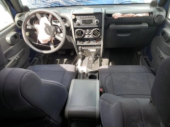 2009 Jeep Wrangler Unlimited Rubicon with VIN 1J4GA69169L762992, listed as a Copart auction lot 51674355 with 147,181 mi miles and Salvage title. Bid and sale history available at DreamBid. Image 8.