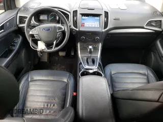 2016 Ford Edge SEL z VIN 2FMPK3J93GBB80120, wystawiony jako Copart lot #56124735 z przebiegiem 104 706 mil mil oraz Szkoda całkowita • Salvage title. Historia ofert i sprzedaży dostępna na DreamBid. Obrazek 8.