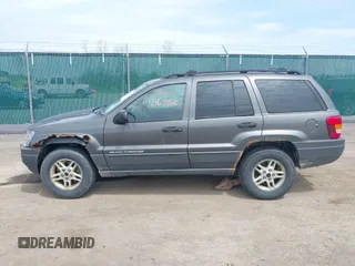 2004 Jeep Grand Cherokee Laredo z VIN 1J4GW48S34C399804, wystawiony jako IAAI lot #42163326 z przebiegiem 203 278 mil mil oraz . Historia ofert i sprzedaży dostępna na DreamBid. Obrazek 14.