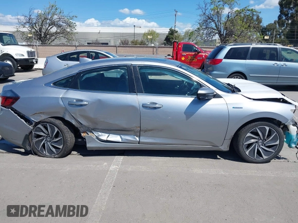 2019 Honda Insight Touring with VIN 19XZE4F93KE007489, listed as a IAAI auction lot 41943334 with 118,689 mi miles and . Bid and sale history available at DreamBid. Image 14.