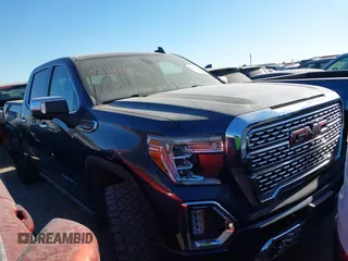 2020 GMC Sierra 1500 Denali with VIN 1GTU9FEL4LZ180967, listed as a IAAI auction lot 41342763 with 44,344 mi miles and . Bid and sale history available at carsss.com. Image 1.
