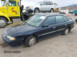 1995 Subaru Legacy L with VIN 4S3BD6353S7226373, listed as a IAAI auction lot 41912014 with 141,304 mi miles and . Bid and sale history available at DreamBid. Image 2.