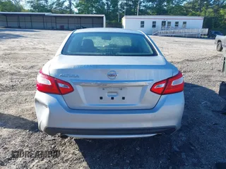2016 Nissan Altima S z VIN 1N4AL3AP2GN392359, wystawiony jako IAAI lot #42187237 z przebiegiem 170 107 mil mil oraz . Historia ofert i sprzedaży dostępna na DreamBid. Obrazek 17.