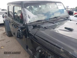 2023 Jeep Gladiator Overland z VIN 1C6HJTFG2PL523686, wystawiony jako IAAI lot #42134627 z przebiegiem 33 575 mil mil oraz . Historia ofert i sprzedaży dostępna na DreamBid. Obrazek 13.