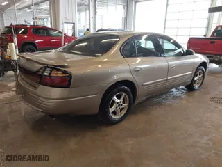 2002 Pontiac Bonneville SE with VIN 1G2HX54K424128538, listed as a IAAI auction lot 41606130 with 147,048 mi miles. Bid and sale history available at carsss.com. Image 4.