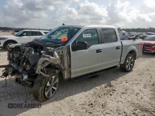 2020 Ford F-150 XL with VIN 1FTEW1EP8LFA93738, listed as a Copart auction lot 61261185 with 166,511 mi miles and Salvage title. Bid and sale history available at DreamBid. Image 1.