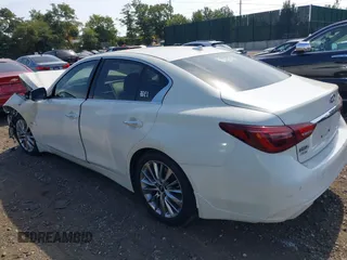 2019 Infiniti Q50 Luxe with VIN JN1EV7ARXKM557946, listed as a IAAI auction lot 40362058 with 56,615 mi miles and . Bid and sale history available at carsss.com. Image 3.