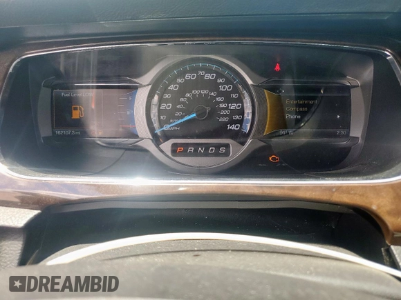 2015 Ford Taurus Limited with VIN 1FAHP2F87FG114302, listed as a Copart auction lot 62407335 with 162,107 mi miles and Salvage title. Bid and sale history available at DreamBid. Image 9.