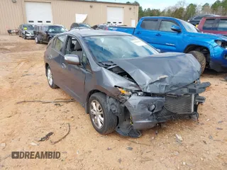 2011 Honda Insight EX with VIN JHMZE2H76BS008793, listed as a IAAI auction lot 41806698 with 105,845 mi miles and . Bid and sale history available at DreamBid. Image 1.