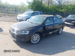 2013 Volkswagen Jetta TDI w/Premium with VIN 3VWLL7AJ5DM390579, listed as a IAAI auction lot 42112031 with 134,995 mi miles and . Bid and sale history available at DreamBid. Image 2.