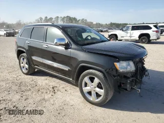2012 Jeep Grand Cherokee Overland with VIN 1C4RJECT5CC362819, listed as a Copart auction lot 48130085 with 107,350 mi miles and Salvage Title. Bid and sale history available at carsss.com. Image 4.
