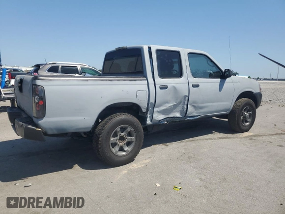 2003 Nissan Frontier XE with VIN 1N6ED27T23C456197, listed as a Copart auction lot 57393515 with 181,596 mi miles and Salvage title. Bid and sale history available at DreamBid. Image 3.