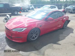 2021 Tesla Model S Plaid z VIN 5YJSA1E69MF439987, wystawiony jako IAAI lot #42496725 z przebiegiem 25 mil mil oraz . Historia ofert i sprzedaży dostępna na DreamBid. Obrazek 19.
