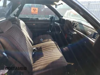 1983 Chevrolet El Camino z VIN 1GCCW80H5DR255003, wystawiony jako Copart lot #63256084 z przebiegiem 23 199 mil mil oraz Szkoda całkowita • Salvage title. Historia ofert i sprzedaży dostępna na DreamBid. Obrazek 10.