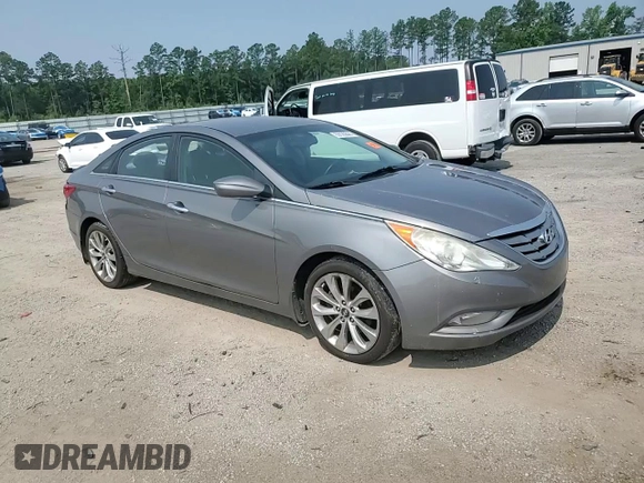 2013 Hyundai Sonata SE z VIN 5NPEC4AC2DH557370, wystawiony jako Copart lot #59120895 z przebiegiem 180 932 mil mil oraz Szkoda całkowita • Salvage title. Historia ofert i sprzedaży dostępna na DreamBid. Obrazek 13.